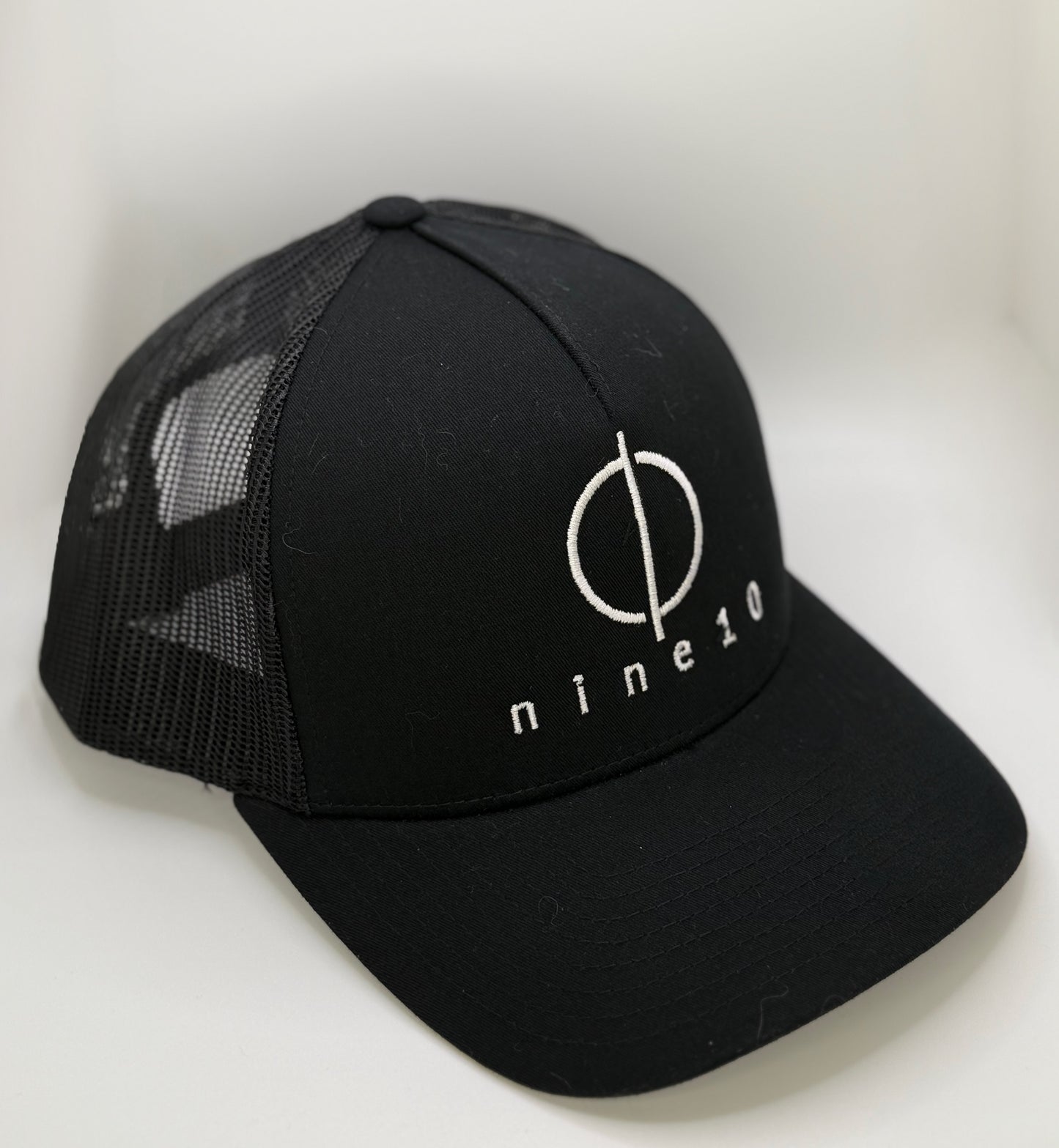 nine10 trucker baseball cap